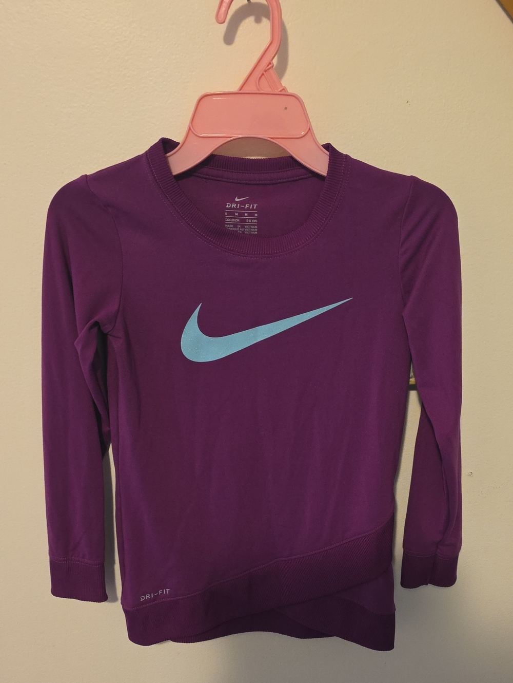 Nike Long Sleeve Dri-Fit Shirt in Purple with Light Blue Swoosh